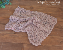 Load image into Gallery viewer, Handmade chunky knitted blanket/layer. Mauve/dusky pink. Photography prop. Ready to send
