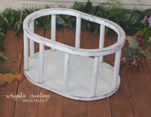 Load image into Gallery viewer, Wooden oval crib. Photography Prop, Sitter, Toddler, Posing prop, Sturdy, White distressed, Cream, Handcrafted, Wooden Studio prop. Made-to-order