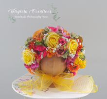 Load image into Gallery viewer, Colourful flower bonnet on wooden stand, tulle yellow tie, photography prop for 6-24 months old, created by Wirginta Creations