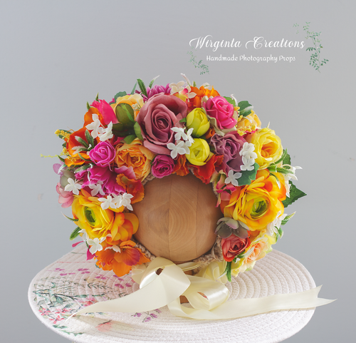 Colourful flower bonnet on wooden stand, tulle yellow tie, photography prop for 6-24 months old, created by Wirginta Creations