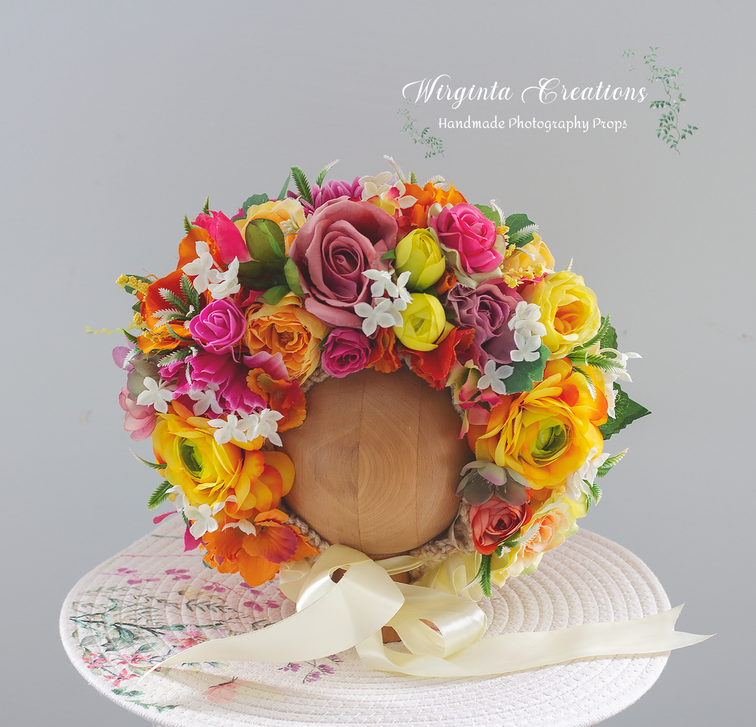 Colourful flower bonnet on wooden stand, tulle yellow tie, photography prop for 6-24 months old, created by Wirginta Creations