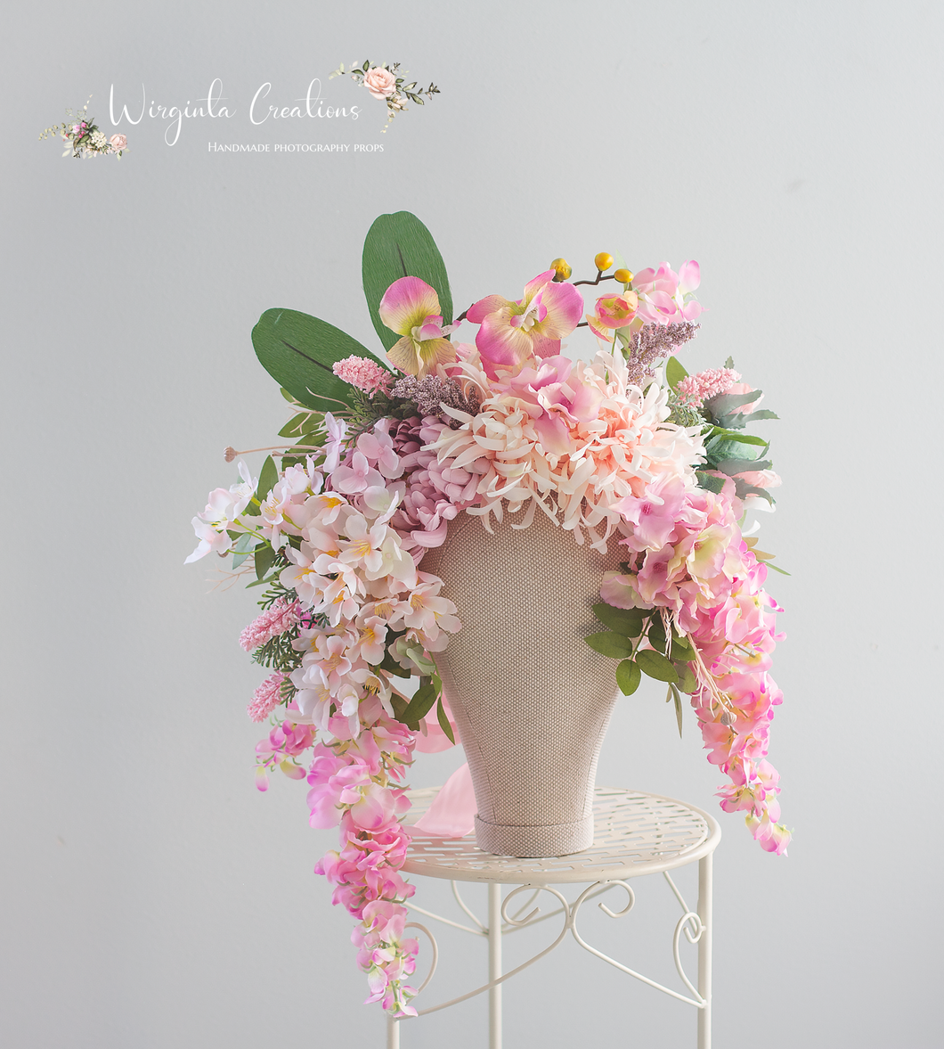 Large cascading headpiece decorated with artificial flowers for adult. Pink. Photography Crown
