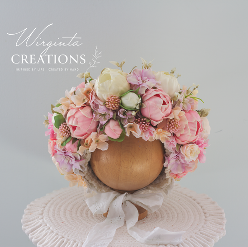White, Pink flower bonnet for 12-24 months old. Bonnet placed on a wooden ball stand. Peonies. Brand: Wirginta Creations