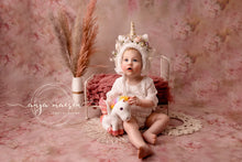 Load image into Gallery viewer, Handmade unicorn bonnet for 6-12 months old. Decorated with artificial flowers and faux fur. Pastel colours. Sitter, toddler headpiece. Ready to send