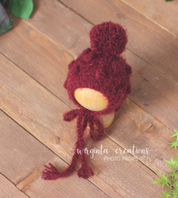 Load image into Gallery viewer, Knitted snuggle sack/cocoon and matching bonnet for newborn. Burgundy. Bubbly knit style. Photography prop. Ready to send