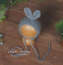 Load image into Gallery viewer, Knitted bunny bonnets for newborn. Handmade. Colours available:  Grey,  Pink,  Yellow,  Blue. Ready to send photography props