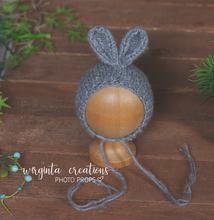 Load image into Gallery viewer, Knitted bunny bonnets for newborn. Handmade. Colours available:  Grey,  Pink,  Yellow,  Blue. Ready to send photography props