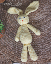 Load image into Gallery viewer, Knitted bunny toy. Handmade. Yellow. Knitted. Posing toy. Easter. Ready to send