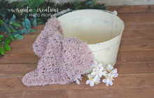 Load image into Gallery viewer, Handmade chunky knitted blanket/layer. Mauve/dusky pink. Photography prop. Ready to send