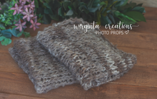 Load image into Gallery viewer, Handmade chunky knitted blanket/layer. Grey/brown. Photography prop. Ready to send