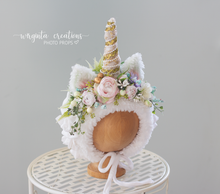 Load image into Gallery viewer, Handmade unicorn bonnet for 6-12 months old. Decorated with artificial flowers and faux fur. Pastel colours. Sitter, toddler headpiece. Ready to send