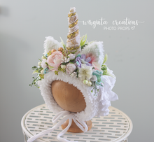 Load image into Gallery viewer, Handmade unicorn bonnet for 6-12 months old. Decorated with artificial flowers and faux fur. Pastel colours. Sitter, toddler headpiece. Ready to send